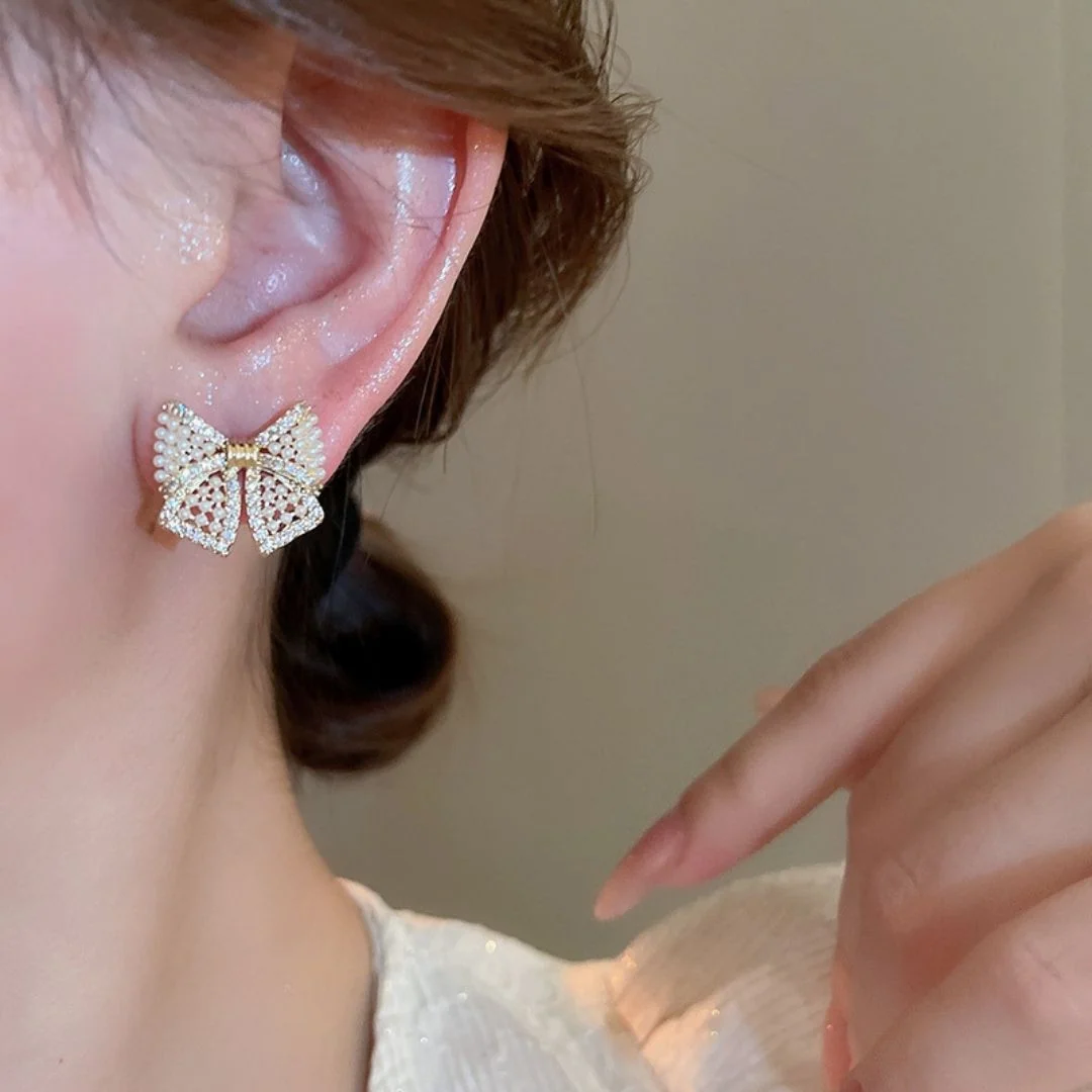 Gilded Pearl Bow Studs Earrings - midzumi